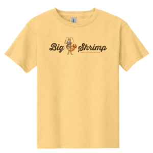 A yellow t-shirt with the words big shrimp written in brown.